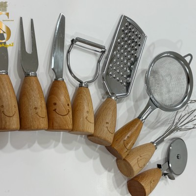 ابزار آشپزخانه استیل دسته چوبی لبخند